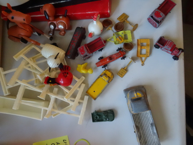 lot 58 image: Miller lite bucket and toys