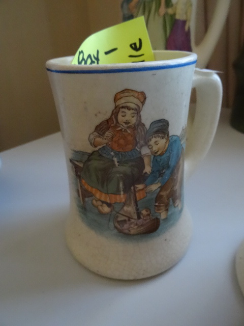 lot 83 image: Roseville pottery dutch mug. 111-3....