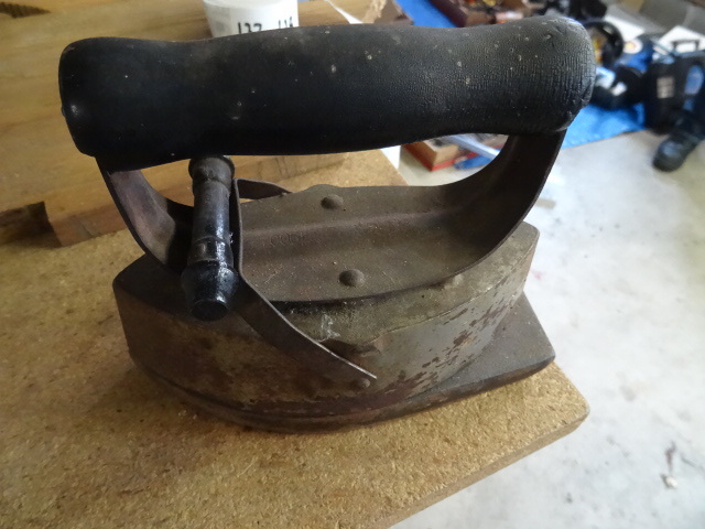 lot 137 image: Vintage stove iron. Patent May 22 1...