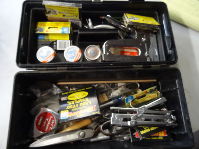 lot 174 image: Plastic tool box with misc staplers...