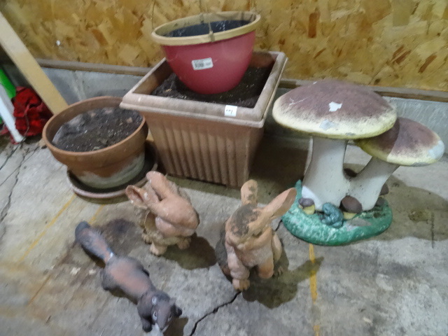 lot 201 image: Garden dcor. 2 rabbits. Squirrel....