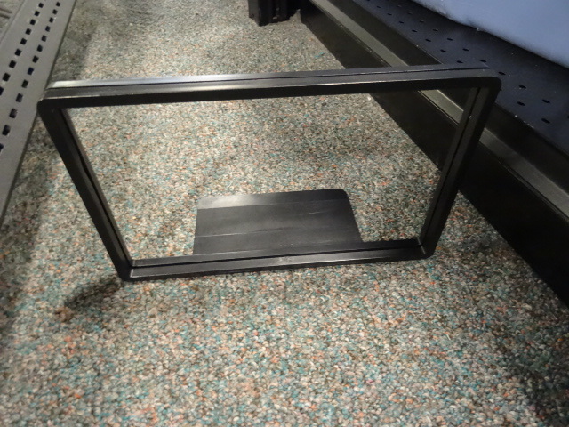 lot 29 image: Bin full of plastic display signs. ...