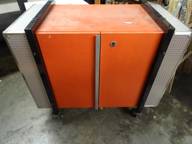lot 104 image: 2 door storage cabinet on wheels. 3...
