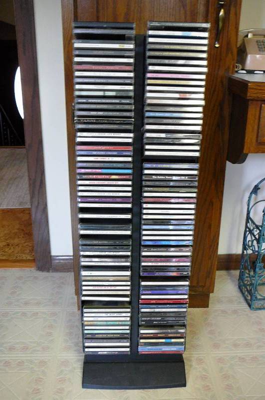 lot 22 image: CD holder with 100 CDs,  Barbara Streisand, Celtic Woman, Yani, Celion Dion, Harry Conic Jr, Eric Clapton, George Gershwin & More