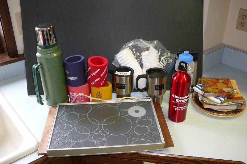 lot 86 image: Lot of Cups, Can Coolers, Paper plates, Napkins, Thermos Electric Food Warmer, Thermos