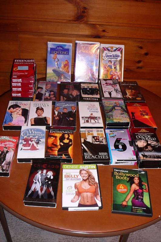 lot 175 image: Lot of Vhs Movies 28 Count Tombstone, Entrapment, Green mile, Aladdin, Lion King, etc.