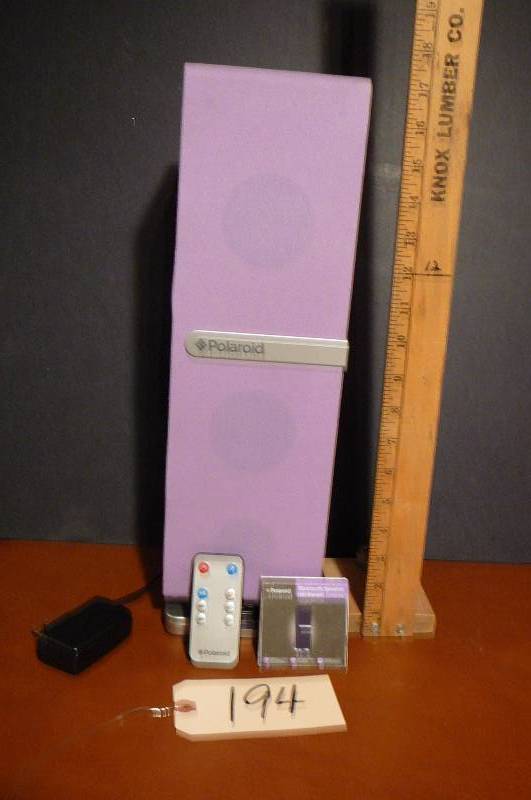 lot 194 image: polaroid Blue Tooth Speaker with Remote