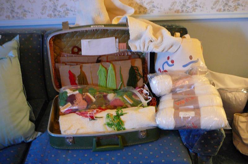 lot 298 image: Suitcase and yarn with 2 crochet hooks