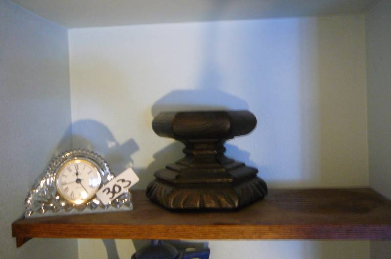 lot 303 image: Clock, Candle holder