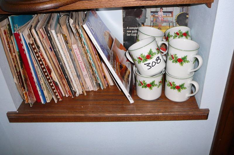 lot 308 image: Misc. Cookbooks and Christmas Coffee Mugs
