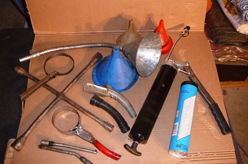 lot 421 image: Grease Gun and ends Grease Filter Wrenchs funnels 4 way Tire Iron