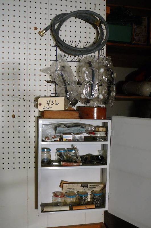lot 436 image: Cabinet 18 x 13 x 4, Safety glasses 3 count, Knife, Hardware, Copper ends, Washer  Hose