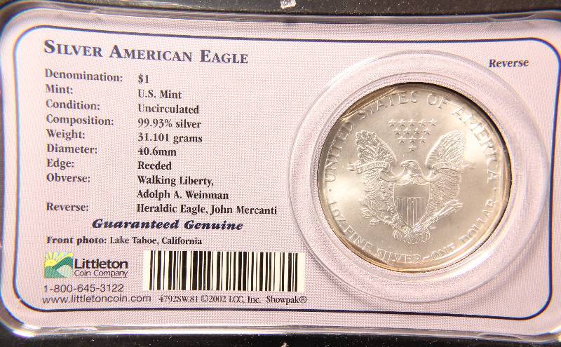 lot 14 image: 2001 AMERICAN SILVER EAGLE 1 TROY OZ. .999 FINE SILVER DOLLAR IN LITTLETON HOLDER