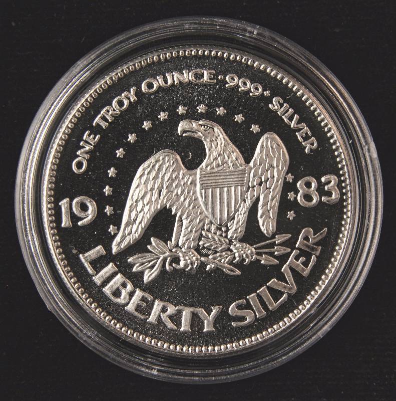 lot 18 image: 1 TROY OZ. .999 FINE SILVER VINTAGE 1983 A-MARK LIBERTY IN AIRTITE HOLDER