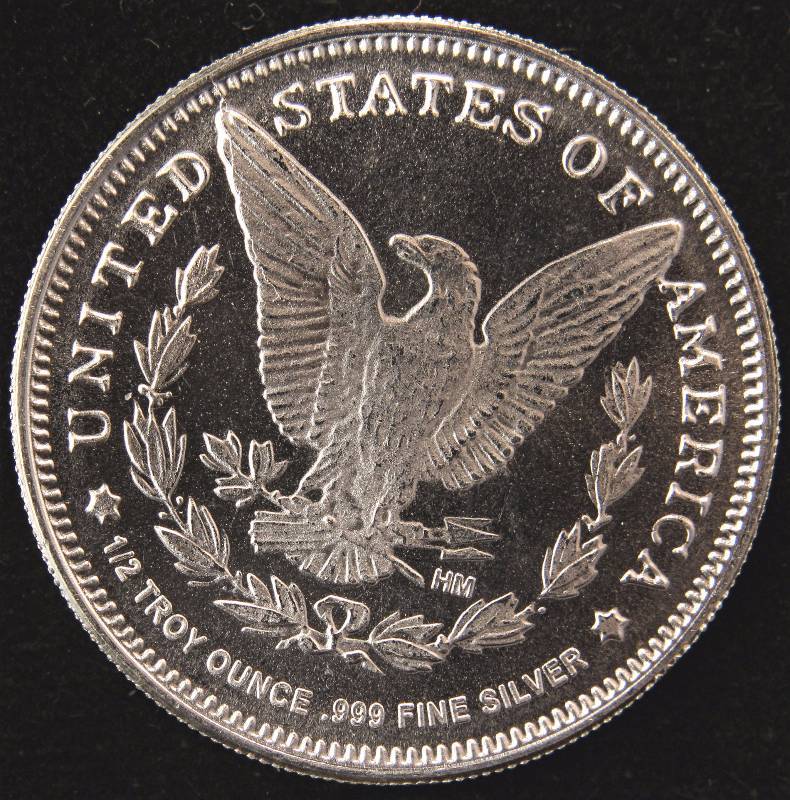 lot 25 image: 12 TROY OZ. .999 FINE SILVER MORGAN DOLLAR DESIGN