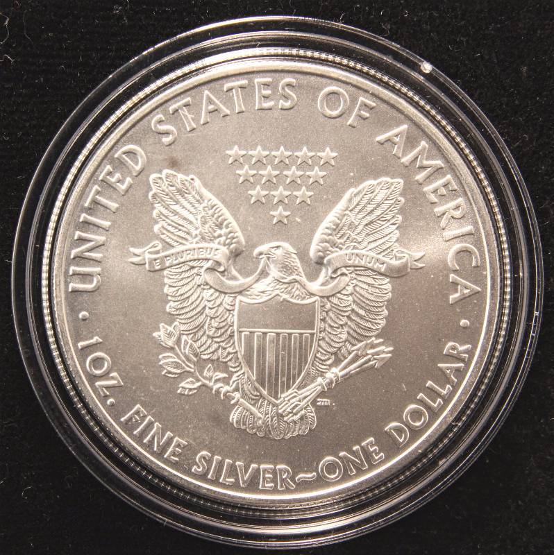 lot 34 image: 2009 AMERICAN SILVER EAGLE 1 TROY OZ. .999 FINE SILVER DOLLAR IN AIRTITE HOLDER