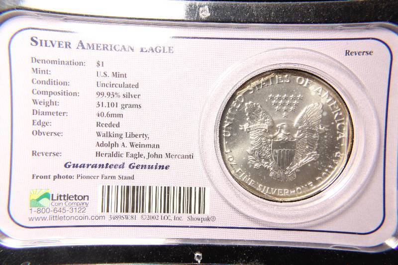 lot 41 image: 1991 AMERICAN SILVER EAGLE 1 TROY Oz. .999 FINE SILVER DOLLAR IN LITTLETON HOLDER