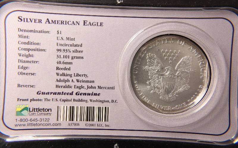 lot 54 image: 2000 AMERICAN SILVER EAGLE 1 TROY OZ. .999 FINE SILVER DOLLAR IN LITTLETON HOLDER