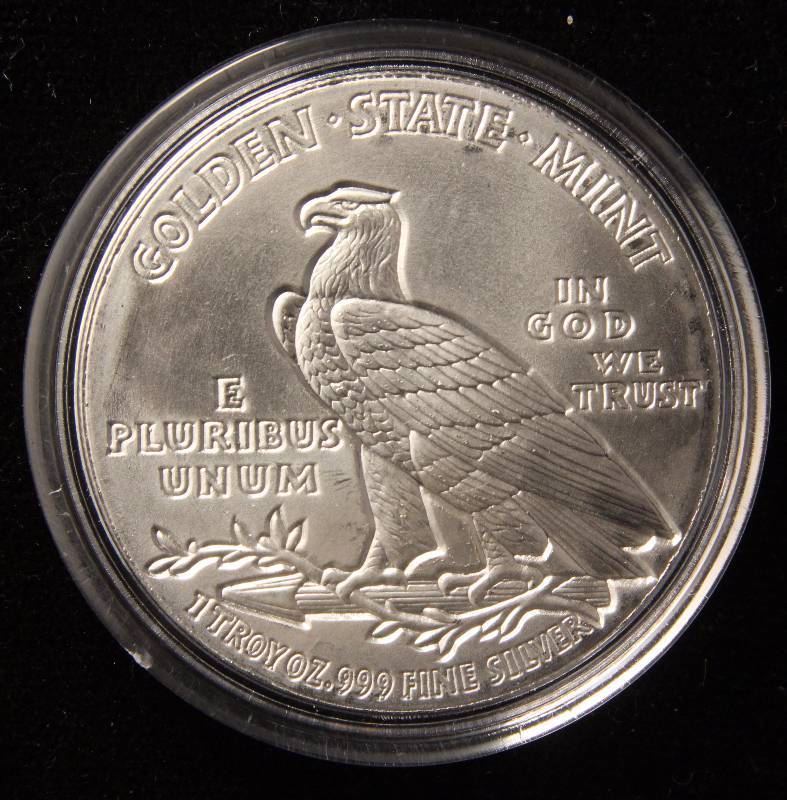 lot 55 image: 1 TROY OZ. .999 FINE SILVER ROUND INCUSE INDIAN DESIGN IN AIRTITE HOLDER