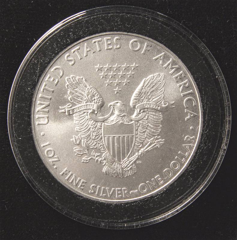 lot 58 image: 2008 AMERICAN SILVER EAGLE 1 TROY OZ. .999 FINE SILVER DOLLAR IN AIRTITE CAPSULE