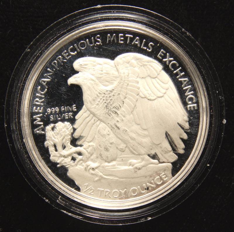 lot 62 image: 12 TROY OZ. .999 FINE SILVER WALKING LIBERTY DESIGN