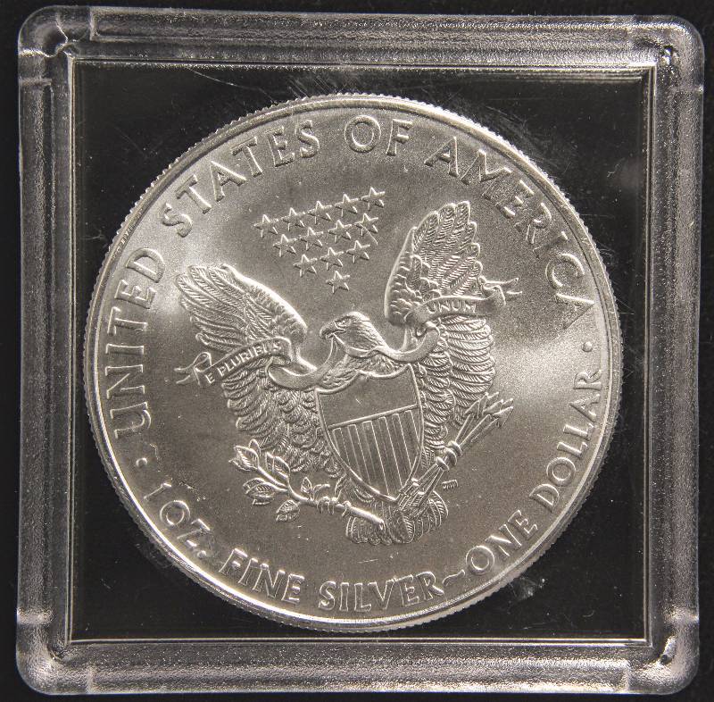 lot 63 image: 2011 AMERICAN SILVER EAGLE 1 TROY OZ. .999 FINE SILVER DOLLAR IN AIRTITE CAPSULE