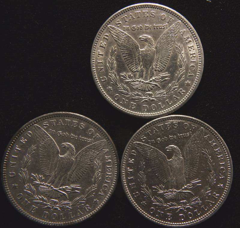 lot 93 image: GROUP OF 3 MORGAN SILVER DOLLARS 1880-O, 1883-O & 1896
