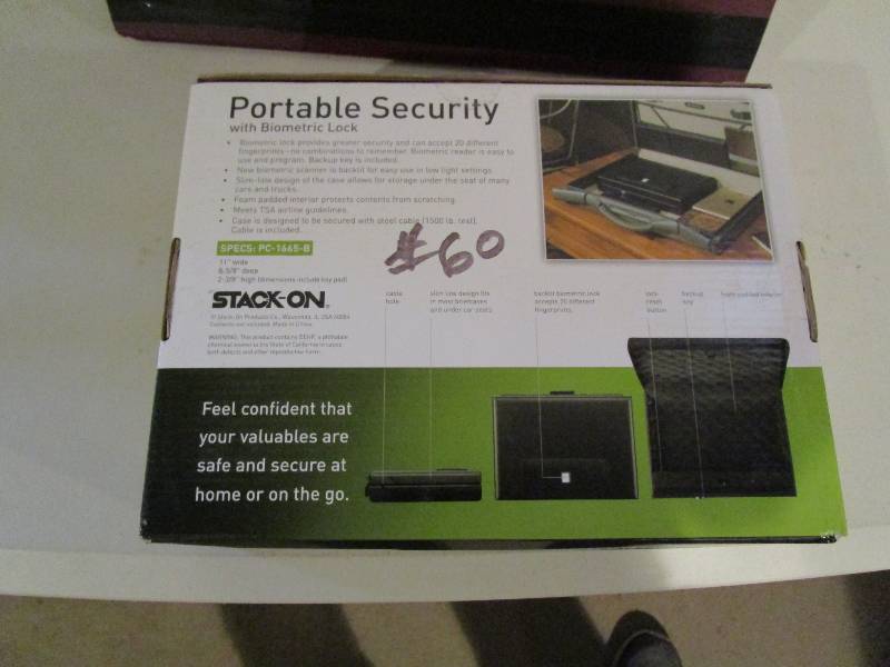 lot 60 image: Portable Security with Biometric Lock
