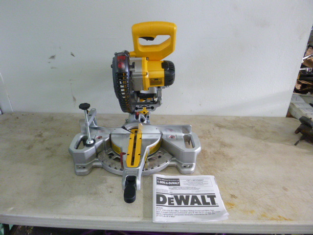 lot 5 image: DeWalt 7 14 Cordless Sliding Compound Mitre Saw
