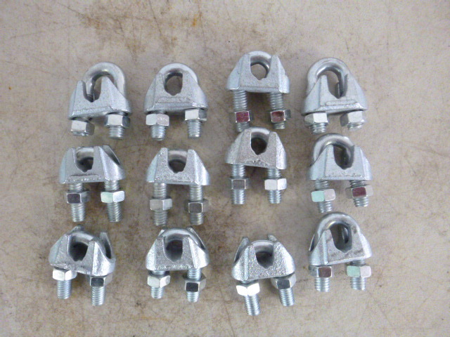 lot 37 image: 12 Cable Clamps