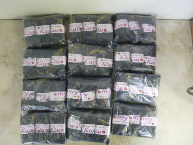 lot 186 image: 12 Packs of Red Heart Kiss Yarn