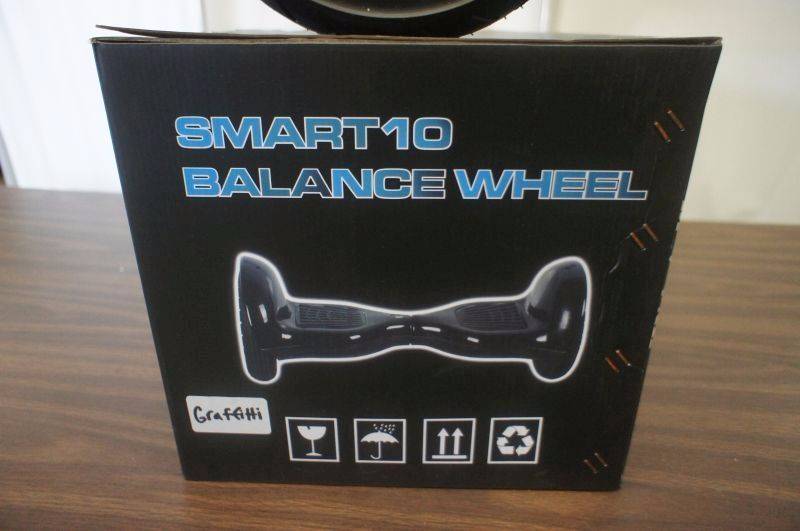lot 10 image: NEW - 10 Smart Balance Wheel - Hoverboard - Real Rubber Tires - Graffiti Color - Bluetooth Compatible - Remote - Charger - MSRP $899.99