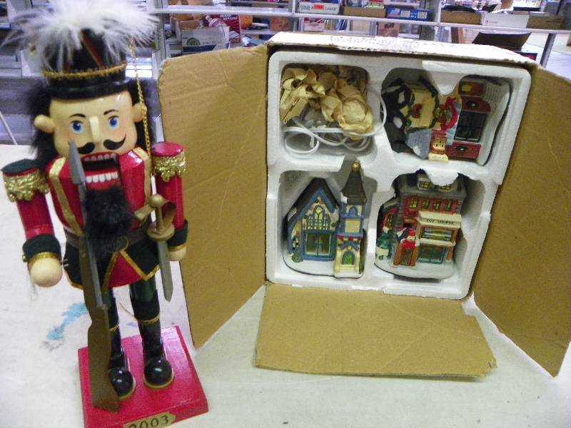 Nutcracker and snow village houses