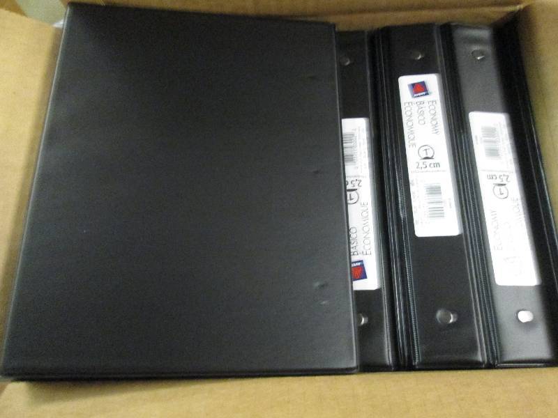 lot 64 image: 1 case of 5.5x8.5 3 ring binders bl...