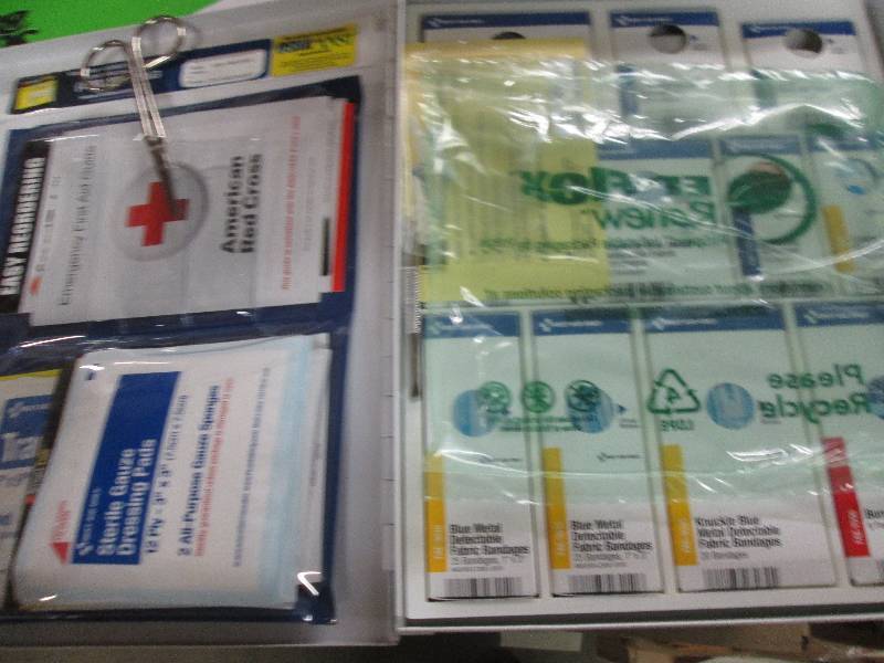 lot 261 image: 1 metal first aid kit full of suppl...