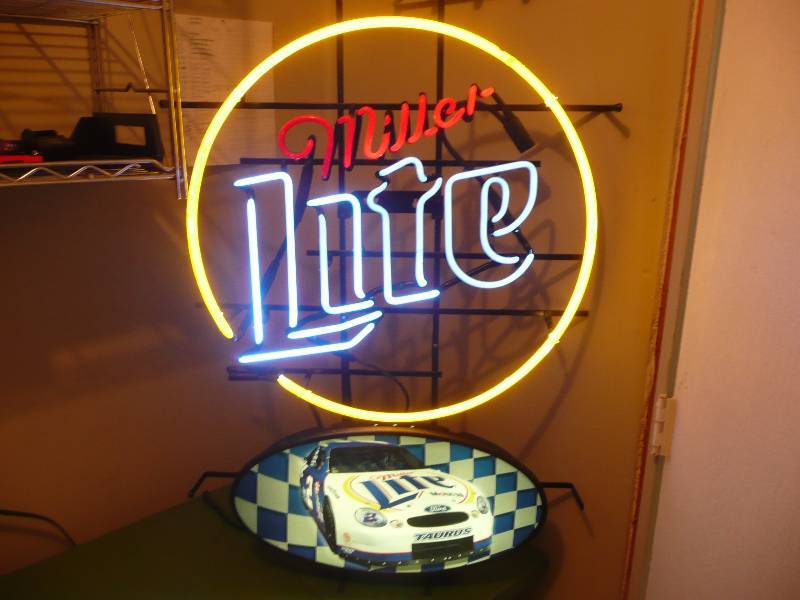 lot 5 image: Miller Lite Rusty Wallace Neon Light - Approx 19wide 23high - Works Good