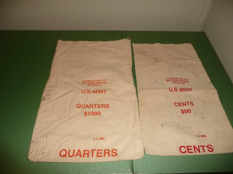 lot 44 image: Two Authentic U.S. Mint Bags - See Pictures
