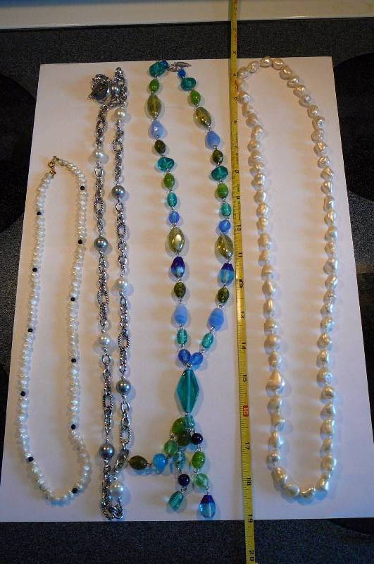 Necklace tied between pearls and Misc. necklaces