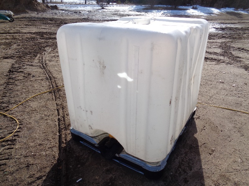 lot 113 image: 275 Gallon Tote with Drain
