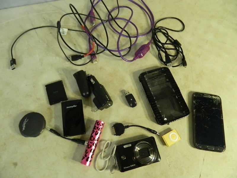 lot 27 image: Apple IPod, Camera, Powerpacks, and More