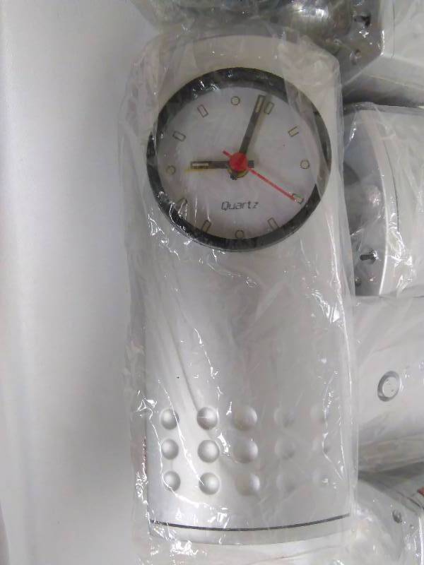 lot 32 image: Flash Light and Alarm Clock (8)