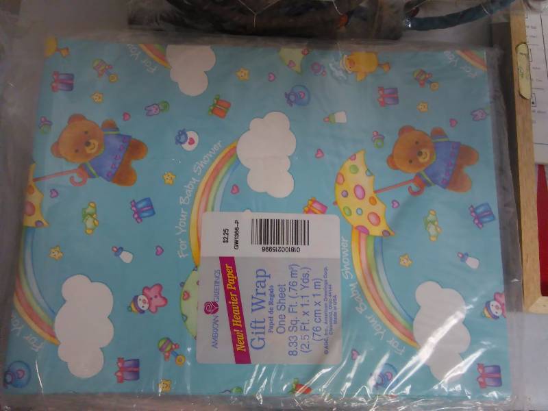 lot 544 image: Dreamer Catchers (2), Combination Board Game, Baby Shower Gift Wrap (9) and Memo Pads (12pads, 100 ct. ea.)