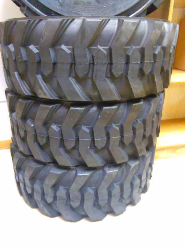 lot 1 image: Skid Loader Tires (4) 12-16.5 N.H.S. Allied RBT