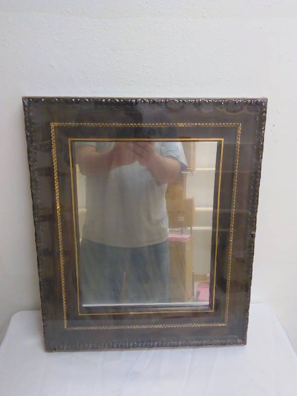lot 18 image: Mirror, Brown Frame, measures 19 inches x 16 inches