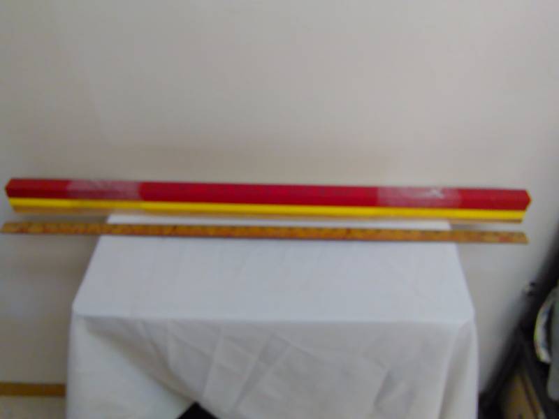 lot 41 image: Yard Sticks (12) 36 inches long