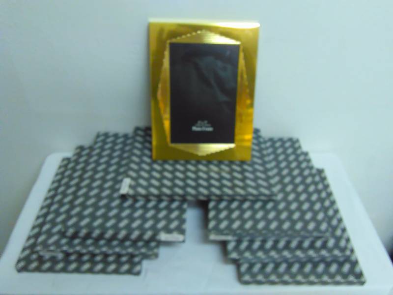 lot 68 image: Picture Frames, Gold Chrome, Metal 5 x7, Table top or hang (7)