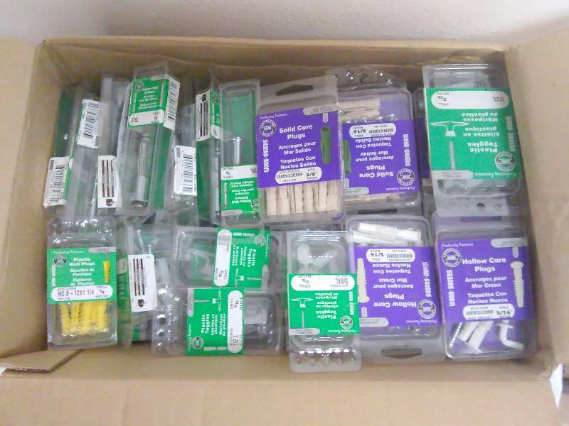 lot 176 image: This lot contains new in package 100 packages of anchor Screws. Qty varies per package.