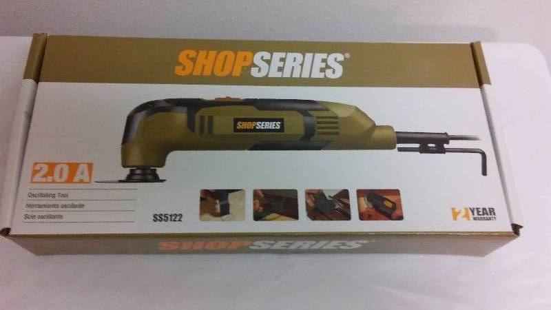 lot 202 image: Oscillating Tool by Shop Series 2Amp with accessories
