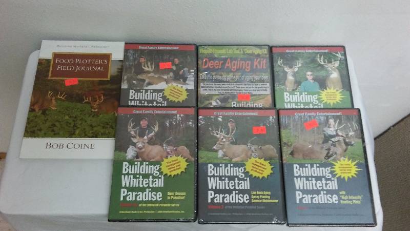 lot 221 image: Deer Hunting book and six DVDs