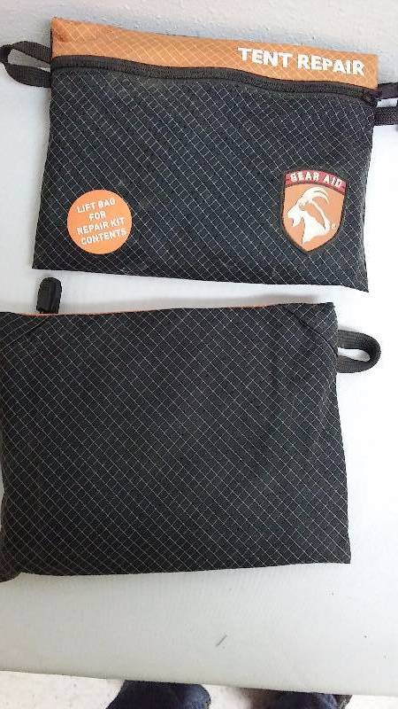 lot 223 image: Tent Repair Kit (2) and Mirazyme Odor Eliminator, even skunk (2) by Gear Aid